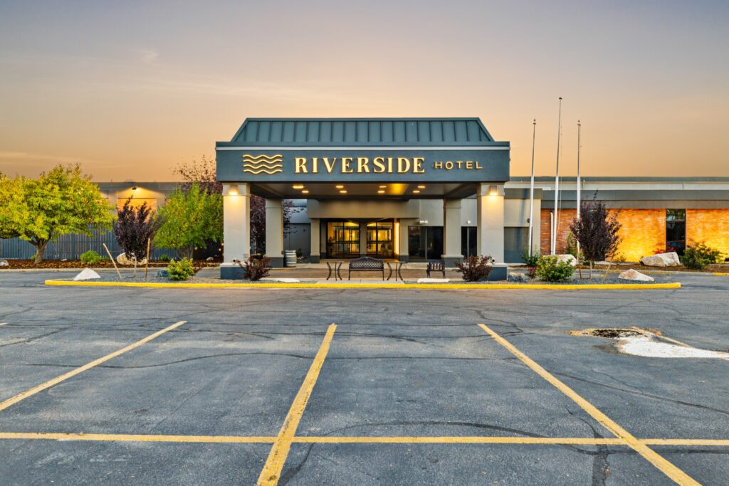 Riverside Hotel entrance lit up at twilight in Casper, Wyoming