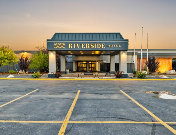 Riverside Hotel entrance lit up at twilight in Casper, Wyoming